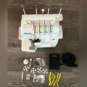Like New Baby Lock White Serger Sewing Machine Conditions in Working Great 100%